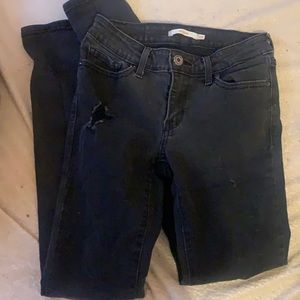 Blacked ripped jeans